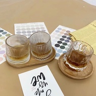 Set of 6 rotating convex base glass cups for bars and coffee shops