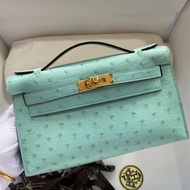 POCHETTE REAL OSTRICH BLUE ATOLL