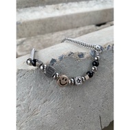 smiley face and dice necklace