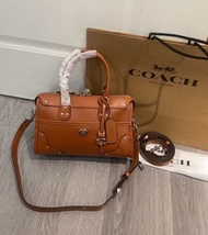 Coach Rhyder Satchel 24 Vintage Moto Barrel Bag 女士馬鞍棕色