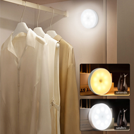 โคมไฟ LED แบบชาร์จไฟผ่าน USB แบบไร้สายพร้อมเซ็นเซอร์ตรวจจับการเคลื่อนไหวกลมสำหรับตู้เสื้อผ้าบันไดห้องครัวห้องนอน