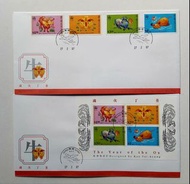 歲次丁丑（1997牛年）郵票及小全張首日封各一個，蓋機場郵政局圖案郵戳，封身有微黃