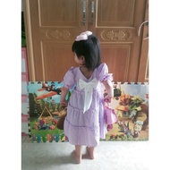 Layered dress with bow at the back for girls from 9 to 22kg
