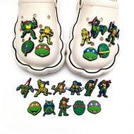 ชุดตัวต่อรูปตัวการ์ตูนสีเขียว1ชิ้นของ TMNT ภาพยนตร์ PVC Croc Clogs Jibz อุปกรณ์เสริมรูปเต่าแบบทำมือเ