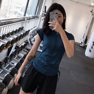 เสื้อยืดโยคะแห้งเร็วสำหรับผู้หญิงในช่วงฤดูร้อนปี 2023 เสื้อออกกำลังกายแบบลำลองสำหรับวิ่งตอนเช้าพร้อม