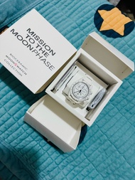 Swatch omega mission to the moon phase