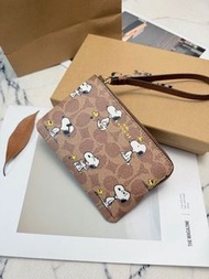 Coach X Peanuts Classic Signature Snoopy Woodstock Print Zip Wristlet Pouch Wallet