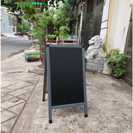 Double-sided wooden menu board displaying coffee shops and milk tea shops