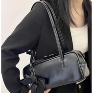 Baguette shoulder bag, a contemporary women's shoulder bag