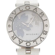二手BVLGARI B-zero1 BZ30FDSL 女士手錶，採用不鏽鋼和皮革錶殼、花卉石英機芯、類比顯示和白色貝殼錶盤。