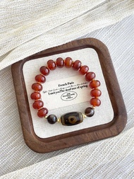 Two Eye Dzi Bead Red Agate Bracelet