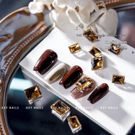 Set of 10 tea-colored cubes in 2 sizes for nail decoration