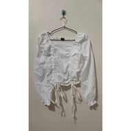 White Long-Sleeved Shirt "Dee For Sale" Sign