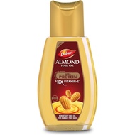 Dabur Almond Hair Oil. Keeps Hair Damage Free