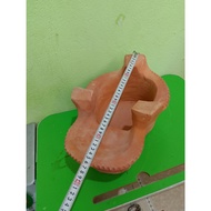 Small terracotta furnace symbol number 3