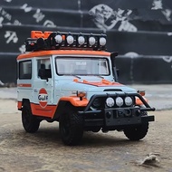 1:24 FJ CRUISER FJ40อ่าวรุ่นล้อแม็กรถยนต์รุ่น D Iecasts โลหะของเล่นยานพาหนะออฟโรดรถรุ่นจำลองคอลเลกชันเด็กของขวัญ