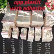 OPP Plastic (w/Adhesive) Good Quality packaging bag /hang tag W /HOLES 2 STYLE per pak 97~100 pcs