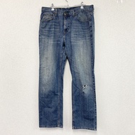 TOMMY JEANS 牛仔褲，拉鍊門襟，垂直褪色，靛藍色，尺寸 W34（古著）。