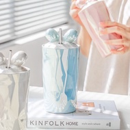 Ceramic Tumbler with Ribbon Motif + Straw Metallic Tumbler Glass/