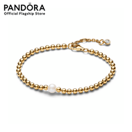 Pandora 14k Gold-plated bracelet with white treated freshwater cultured pearl and clear cubic zirconia