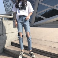 Korean version of the knee man-hole Joker jeans Flash nine straight jeans leisure pants women s slim