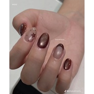 Nail box with brown eyes A11