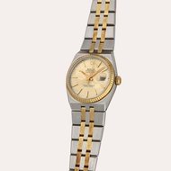 Rolex Oysterquartz Datejust, Reference 17013 | A yellow gold and stainless steel wristwatch with dat