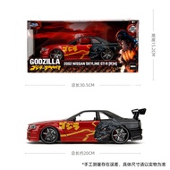 โมเดลรถยนต์ Jada 124 Godzilla Movie Version Nissan GTR R34 ประตูเปิดได้ วัสดุอัลลอยด์ ของสะสม ของเล่