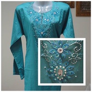 Baju kurung beads