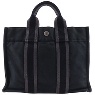 二手愛馬仕 Sack Fourre Tout PM 手提包，黑色棉質帆布材質，A5 型按扣開合。男女通用。