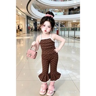 Set of brown polka dots tied at the back for babies from 8-23kg
