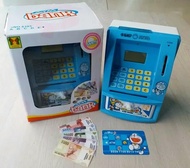 Agenmainan - Mainan Anak Celengan ATM Mini Bank Karakter Anak Menabung Mesin Hitung Saldo Uang Bahas