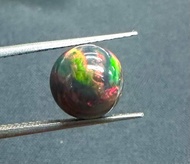 โอปอลสีดำ 2.87 กะรัต ทรงกลม 9.7 มม. พลอยธรรมชาติ 100% Black opal 2.87cts 9.7mm round shape 100% natu