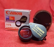 กล้องส่องพระ/เพชร Canon สีดำหุ่มยาง กำลังขยาย10X18 เลนส์สามชั้น เคลือบมัลติโค็ด แถมฟรีซองหนัง