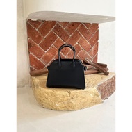 - BECCA TOGO BAG