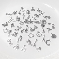 SET OF 50 SYNTHETIC CHARMS WITH NO MATCHES FOR BRACELETS