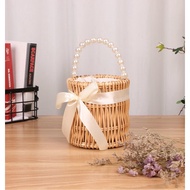 Vertical Jade Handle Rattan Bag