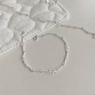 AG1 BUTTERCREAM Tracey s925 Sterling Silver Ribbon Knot Link Chain Bracelet