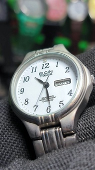 Đồng hồ si nữ Nhật Bản Elgin Titanium đính kim cương pin Solar