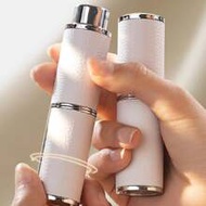 1pc Large Perfume Refillable Bottle, Rotating Pump Leather Sprayer, 8ml Portable Refill Empty Bottle