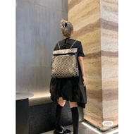 Goyard lightweight canvas travel flap backpack with magnetic closure