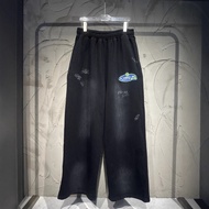 YP3I BLCG Graffiti-style signature trousers with embroidery and print, heavy wash and distressed fin