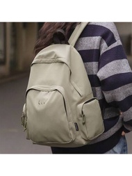 Mochila nueva de mujer para el trabajo diario, bolso de hombro en versión coreana, simple y de ocio estilo escolar, con gran capacidad y ligera para viaje de moda de color sólido