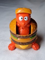 1990年麥當勞開心樂園餐的「巨無霸恐龍」(Big Mac McDino) 系列玩具