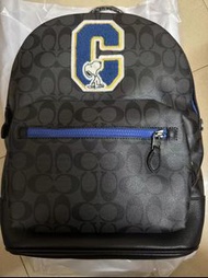 平放Coach雙肩包史努比款