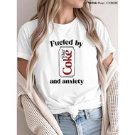 The "Diet Coke and Anxiety" graphic T-shirt humorously interprets caffeine refreshment and modern em