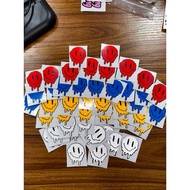 Sticker Smiley Leleh
