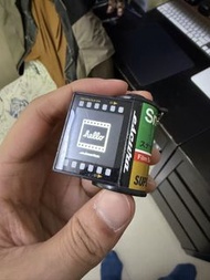 Escura SnapRoll 菲林型數碼相機，是一款模擬 135 菲林 1:1 比例設計的迷你數碼相機吊飾