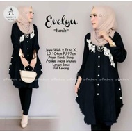 Evelyn TUNIC