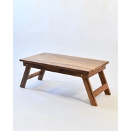 Folding table measuring 40 cm x 70 cm